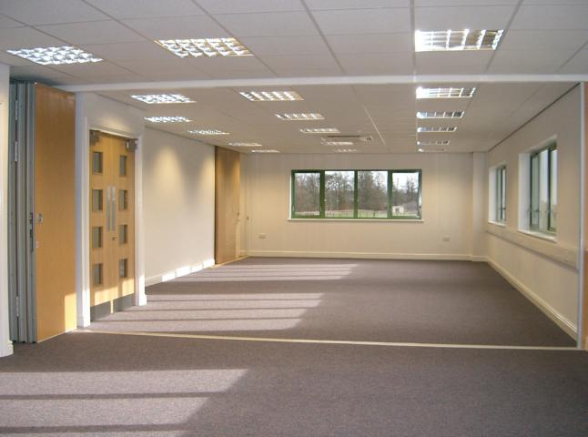 Multifold sliding folding partition Type M80 showing stacked into recess