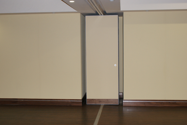 Multifold sliding folding partition M80 stacked into recess